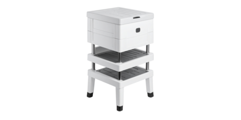 Black and white 3D illustration of stacked radiator and power supply equipment on an office desk
