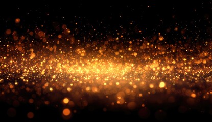 Obraz premium Golden glitter particles on black background