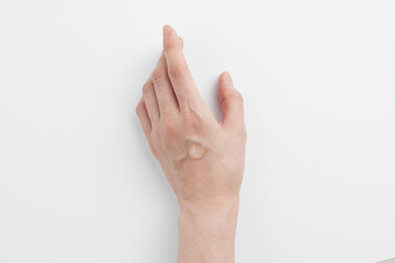 Skincare Beauty. Cosmetic cream texture for gentle moisturizing of healthy hands.