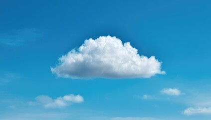Single cumulus cloud against vibrant blue sky (4)