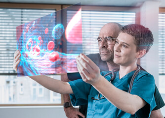 Doctors analyzing medical data with holographic blood vein display