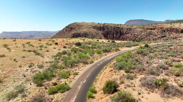 Aerial view of the arid landscape, where the Upper Salt River carves through Armer Mountain, revealing a dramatic canyon with steep cliffs, Tonto Basin, AZ, United States.