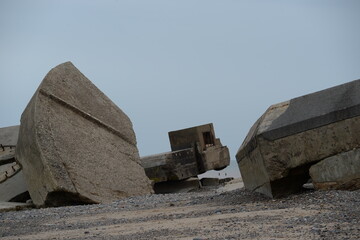 Dilapidated bunkers on the beach near Kilnsea in Yorkshire (England)
