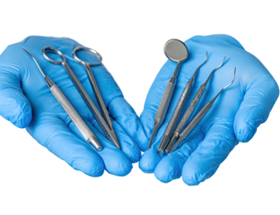 Dental tools held in gloved hands