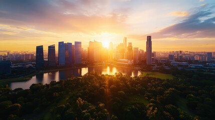 Obraz premium Stunning sunrise over modern city skyline with high-rise buildings reflecting sunlight across river landscape