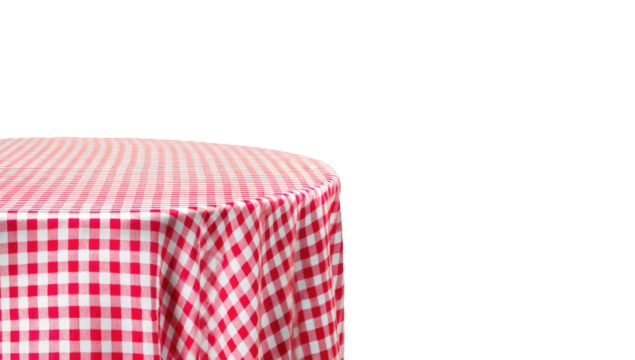 Close-up of a red and white checkered tablecloth draped over a round table, edge highlighted