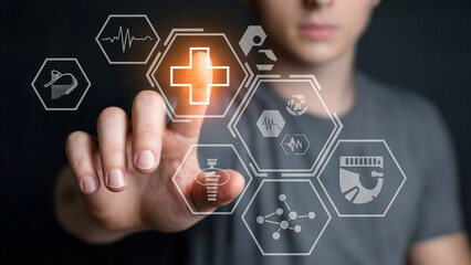 Person touching holographic medical icons on a dark background interface view