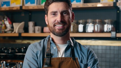 Happy Caucasian middle-aged worker smile portrait entrepreneur small business owner guy waiter man cross arms in cafe coffee shop restaurant male barista looking at camera seller posing cafeteria job
