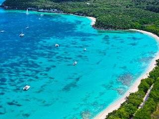 Guadeloupe, Bassa Terra, West Indies. Caribs. Lesser Antilles. Atlantic Ocean. Incredible colors and views. Ocean view. Drone view. View from above. Boats and yachts. High resolution photo. 