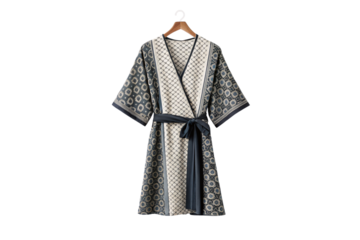 Kimono-style wrap dress featuring contrasting geometric patterns in navy and cream colors, isolated on a transparent background