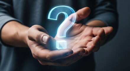 Man holding a digital glowing question mark in his open hands. Conceptual image of inquiry, solution, and problem solving.