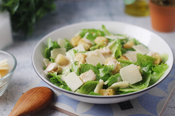 A bowl with classic Caesar salad