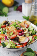 A bowl with Fattoush - Traditional Levantine salad	