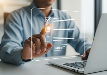 Person's finger touching digital checkbox on screen next to laptop image