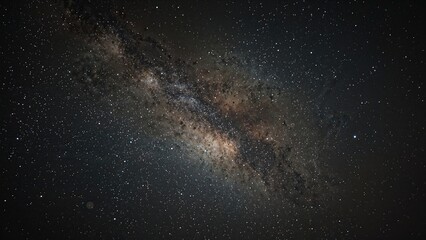 Galaxy cluster with stars and interstellar dust, featuring visible noise and graininess due to extended exposure and elevated ISO settings.