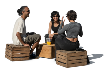 Multinational group of people sitting on wooden boxes in a casual hipster outdoor cafe and talking, isolated on transparent and white background