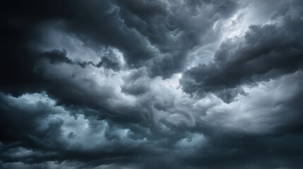 Obraz premium Dramatic Dark Clouds in Stormy Sky for Atmospheric Background