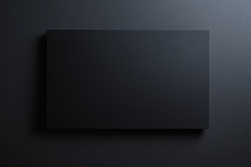 Blank black paper mockup against textured dark background. Professional, minimalistic layout. Ideal for branding, business identity, presentation design, modern art posters, and visual concepts
