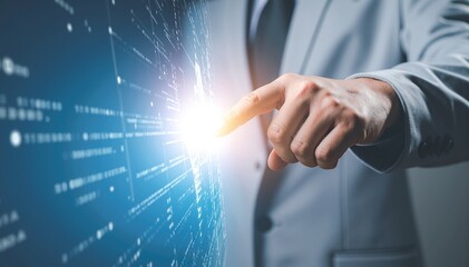 A professional man in a tailored suit stands confidently, pointing at a large screen displaying cascading binary code, symbolizing technology and data analysis.