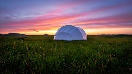 Geodesic Dome in Field at Colorful Sunrise Unique Accommodation Under a Vibrant Sky Offering Peaceful Getaway and Sustainable Travel Experience
