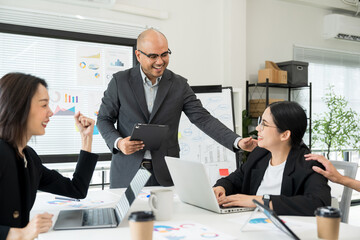 Asian business people team analyzing statistics financial. Group Team of ceo business man and woman Meeting Conference Discussion various topic. Executive professional managers Corporate in office.