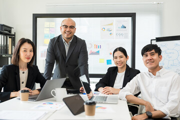 Asian business people team analyzing statistics financial. Group Team of ceo business man and woman Meeting Conference Discussion various topic. Executive professional managers Corporate in office.