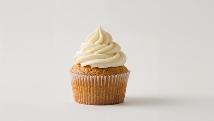 Yummy cupcake decorated with smooth cream on a clean white surface