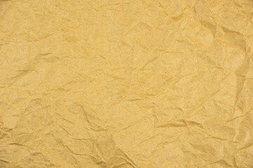 Crumpled brown paper texture background for creative design and artistic projects