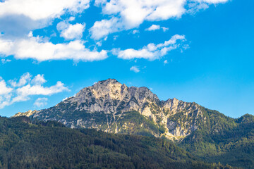 Fototapeta premium Alpine mountain and hill landscape panorama blue sky Salzburg Austria.