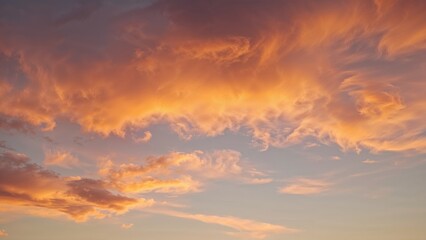 Golden sunset illuminating the cloud-filled sky