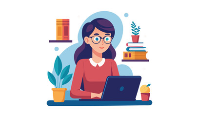 Young woman wearing glasses working on a laptop at her desk