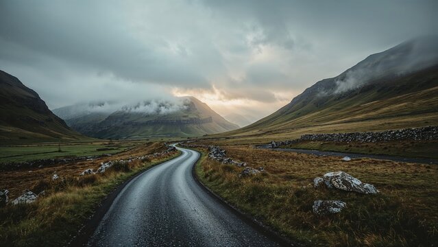 A narrow road twisting through a mountain pass