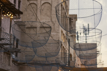 Abstract and Artistic street art installation, sculptures suspended in the air, art installation in local heritage street historic marketplace