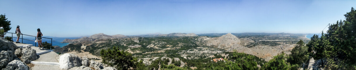 Obraz premium View of islands and Mediterranean Sea from mountain where Holy Monastery of Virgin Mary Tsambika Kyra Psili is located on Rhodes island in Greece