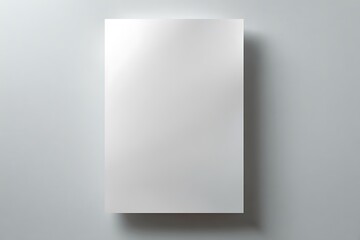 Blank white poster mock up isolated on a grey wall background, clean design