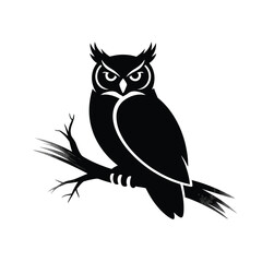 Silhouette of a great horned owl perched on a branch