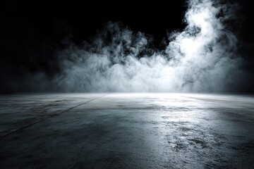 Empty concrete floor, smoky, dark background. Light source illuminates the fog