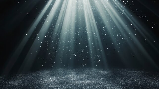 Dramatic light rays illuminate dark textured ground with floating particles.