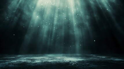 Obraz premium Dark teal background with light rays and particles.