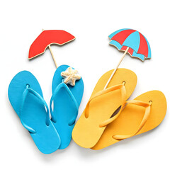 two pairs of slippers on white background