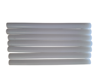 Set of white hot glue sticks for glue gun, used in crafting, DIY, and repairs. Plastic adhesive rods isolated on white background.