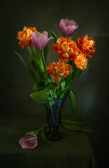 A beautiful bouquet of tulips on a dark background.