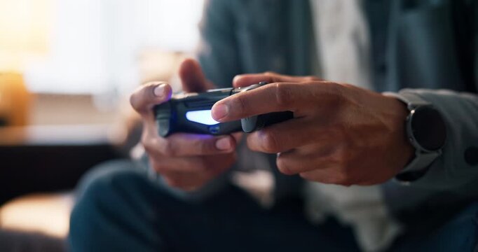 Person, hands and playing games with controller in home for esport, entertainment or subscription. Closeup, gamer or console with remote for competitive gaming, online action or electronic adrenaline