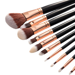 Close up of a set of professional makeup brushes with black handles and rose gold ferrules