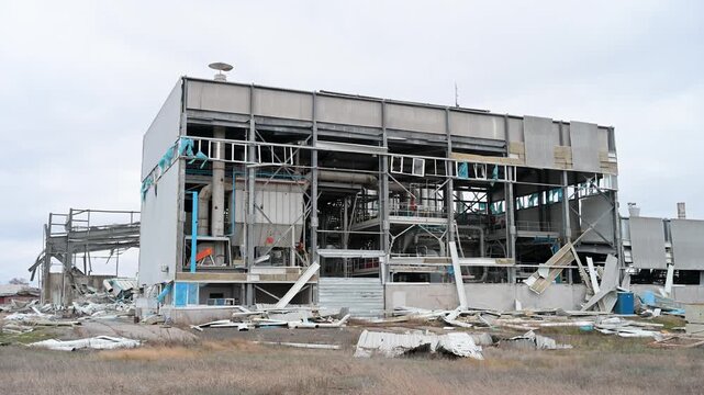 The aftermath of a Russian missile strike on an industrial target near the frontline city of Kramatorsk. The factory building is left a gutted, skeletal ruin by the attack.