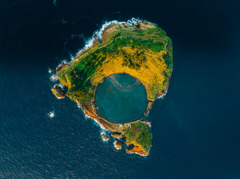 Aerial view of the volcanic islet of Vila Franca do Campo, a mesmerizing emerald jewel embraced by the vast, deep blue Atlantic, Vila Franca do Campo, A&Atilde;&sect;ores, Portugal.