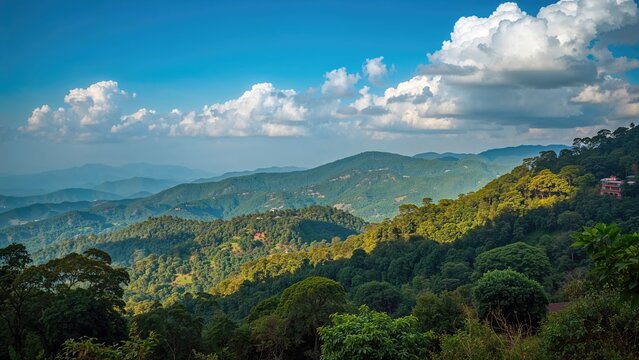 Wide-angle vistas of the Sahyadri hills seen from a nearby hill station, accessible by train and road.