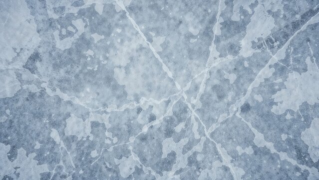 Overhead perspective of ice with skating traces revealing the dynamic nature of the sport.