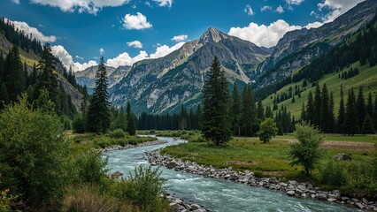 Obraz premium River winding among rugged mountain terrain