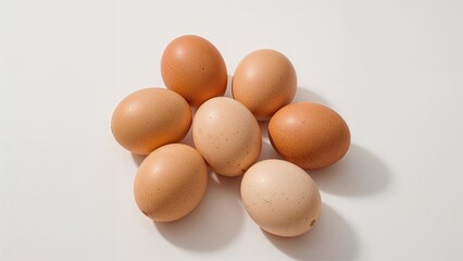 Bunch of eggs displayed on a white surface